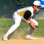 Second baseman Isaiah Cortez scoops up a ground ball.