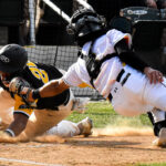 Catcher Mackenzie Higuchi makes the tag to get the out at home plate (versus West Coast Kings, Sunday, June 4th).